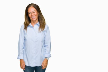 Güzel orta yaş iş yetişkin kadın seksi bir ifadeyle, neşeli ve mutlu yüzünü kameraya bakarak göz kırpıyor izole arka plan.