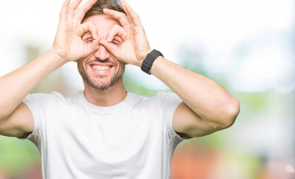 Handsome Man Wearing Casual White Shirt Doing Gesture Binoculars Sticking — Stock Photo, Image