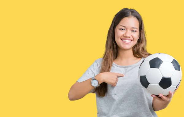 Young Beautiful Brunette Woman Holding Soccer Football Ball Isolated Background — Stock Photo, Image