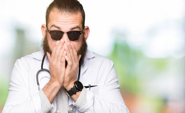 Young Blond Doctor Man Beard Wearing Sunglasses Shocked Covering Mouth — Stock Photo, Image