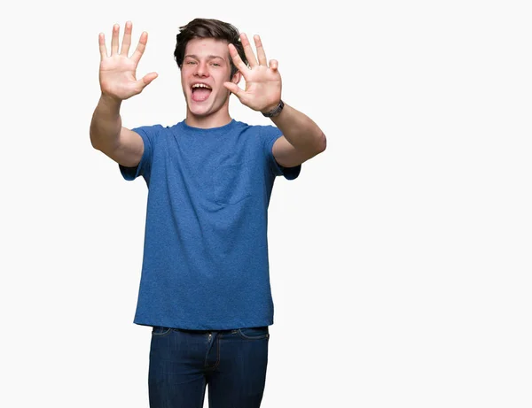 Jovem Homem Bonito Vestindo Camiseta Azul Sobre Fundo Isolado Mostrando — Fotografia de Stock