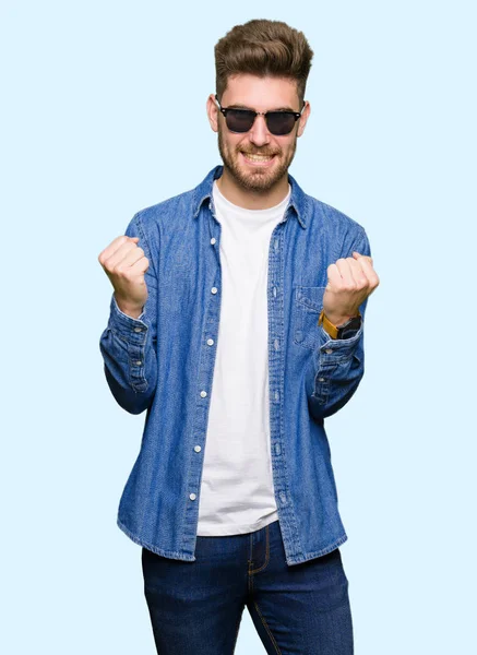 Young Handsome Elegant Man Wearing Denim Jacket Celebrating Surprised Amazed — Stock Photo, Image