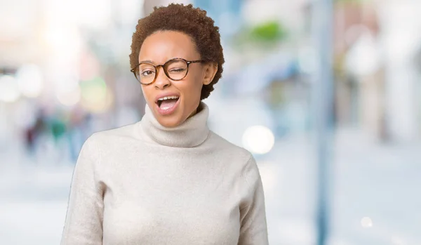 Young Beautiful African American Woman Wearing Glasses Isolated Background Winking — Stock Photo, Image