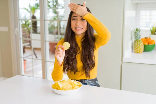 Young Woman Eating Fastfood Potato Chips Stressed Hand Head Shocked — 스톡 사진
