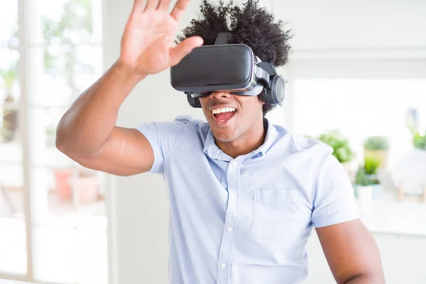 African amaerican man having fun playing with virtual reality gl — Stock Photo, Image