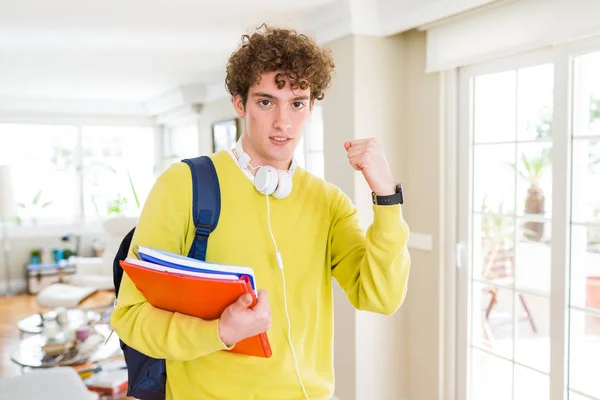 Young Student Man Wearing Headphones Backpack Holding Notebooks Annoyed Frustrated — 스톡 사진