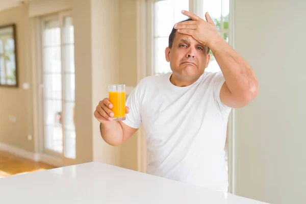 Middle Age Man Drinking Glass Orange Juice Home Stressed Hand — Stock Photo, Image