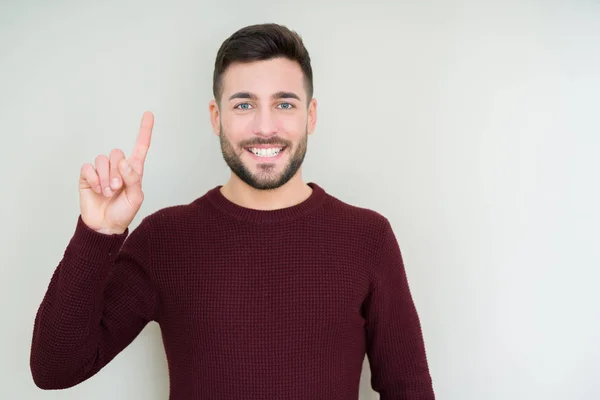 Young Handsome Man Wearing Sweater Isolated Background Showing Pointing Finger — ストック写真