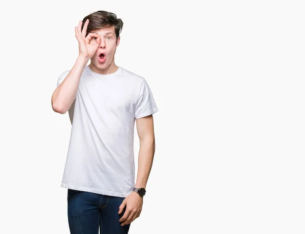 Jovem Bonito Homem Vestindo Casual Branco Shirt Sobre Isolado Fundo — Fotografia de Stock