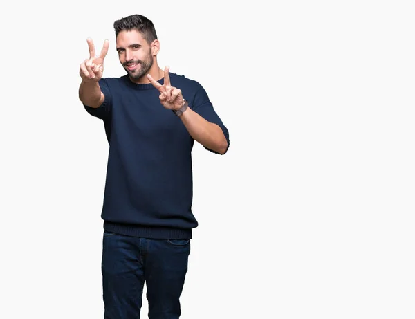 Jovem Homem Bonito Vestindo Suéter Sobre Fundo Isolado Sorrindo Olhando — Fotografia de Stock