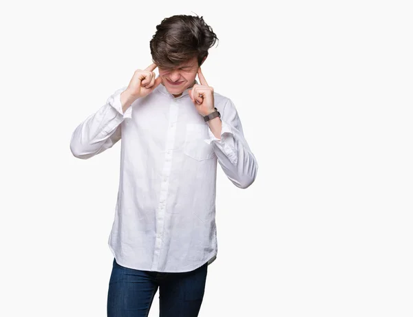 Joven Hombre Negocios Guapo Sobre Fondo Aislado Cubriendo Las Orejas —  Fotos de Stock