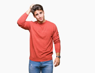 Yakışıklı delikanlı izole arka plan üzerinde yanıltır ve soru hakkında merak ediyorum. Şüphe, kafasına el ile düşünme ile belirsiz. Dalgın kavramı.