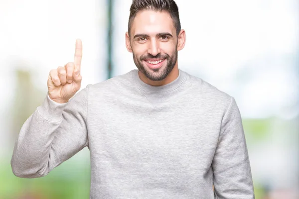 Joven Hombre Guapo Con Sudadera Sobre Fondo Aislado Mostrando Apuntando — Foto de Stock