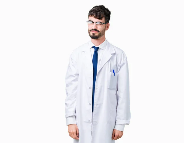 年轻的专业科学家男子穿着白色外套在孤立的背景眨眼看着相机与性感的表情 欢快和快乐的脸 — 图库照片
