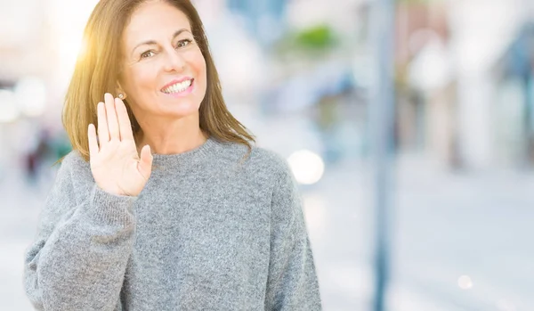 Beautiful Middle Age Woman Wearing Winter Sweater Isolated Background Waiving — Stock Photo, Image