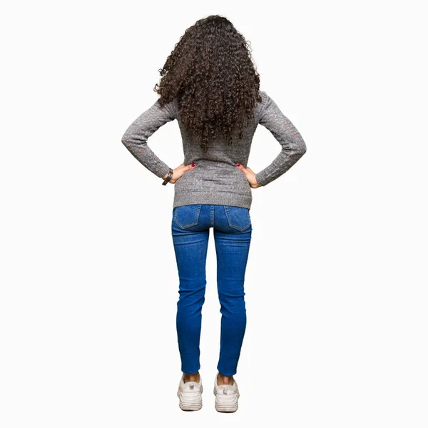 Young Beautiful Woman Curly Hair Wearing Grey Sweater Standing Backwards — Stock Photo, Image