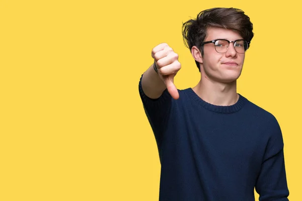 Joven Hombre Guapo Con Gafas Sobre Fondo Aislado Mirando Infeliz —  Fotos de Stock