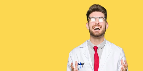 Young Handsome Scientist Man Wearing Glasses Crazy Mad Shouting Yelling — Stock Photo, Image