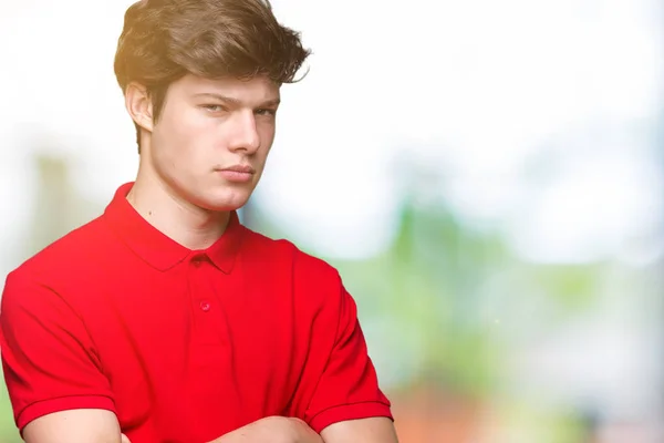 Jonge Knappe Man Met Rode Shirt Geïsoleerde Achtergrond Scepticus Nerveus — Stockfoto