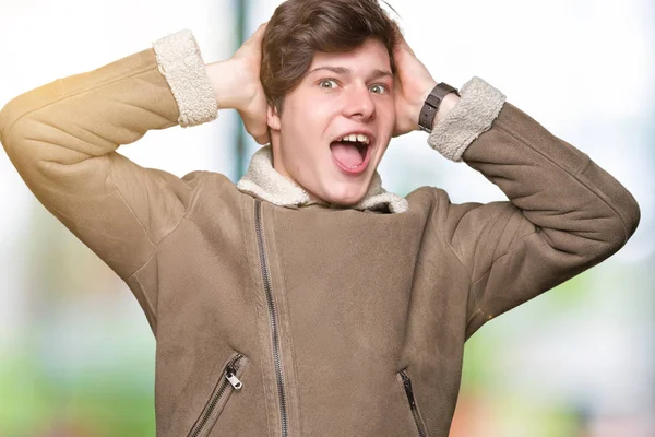 Joven Hombre Guapo Con Abrigo Invierno Sobre Fondo Aislado Loco —  Fotos de Stock