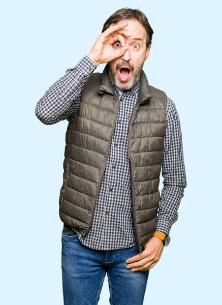 Middle Age Handsome Man Wearing Winter Vest Doing Gesture Shocked — Stock Photo, Image