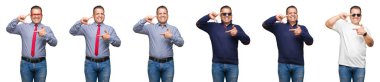 Orta yaş Arap adam elleriyle yapım çerçeve ve parmakları ile mutlu yüz gülümseyen izole arka plan üzerinde bileşimi. Yaratıcılık ve Fotoğrafçılık kavramı.