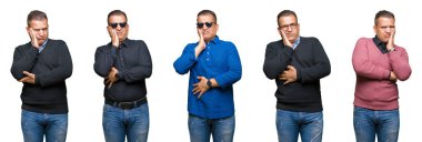 İzole arka plan üzerinde orta yaş Arap adam kompozisyon yorgun bakıyor ve çapraz silah ile depresyon sorunları ile sıkılmış.