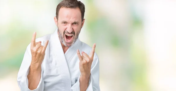 Hombre Mayor Mediana Edad Guapo Con Uniforme Kimono Sobre Fondo —  Fotos de Stock