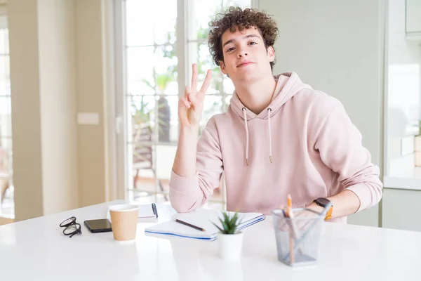 Young Student Man Writing Notebook Studying Smiling Happy Face Winking — 스톡 사진