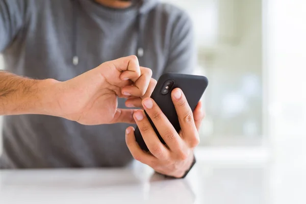 Close up of man using smartphone — Stock Photo, Image