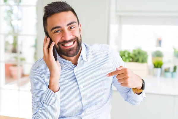 Handsome Hispanic Business Man Having Conversation Talking Smartphone Surprise Face — Stock Photo, Image