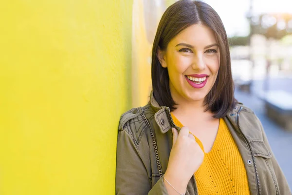 Beautiful Young Woman Smiling Confident Cheerful Leaning Yellow Wall Walking — Stock Photo, Image
