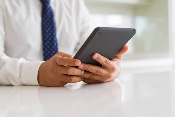 Close up of middle age business man using tablet — Stock Photo, Image