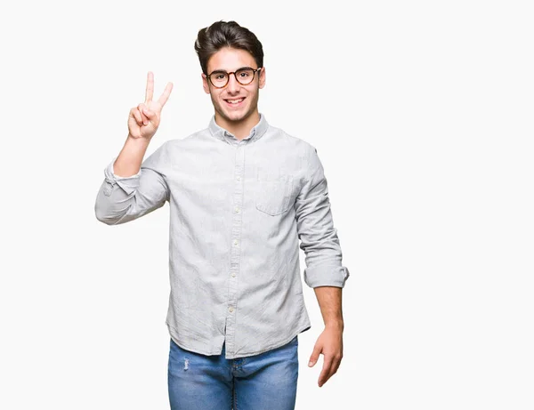 Joven Hombre Guapo Con Gafas Sobre Fondo Aislado Mostrando Apuntando —  Fotos de Stock