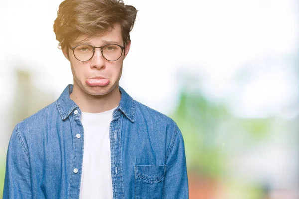 Joven Hombre Guapo Con Gafas Sobre Fondo Aislado Deprimido Preocupado — Foto de Stock
