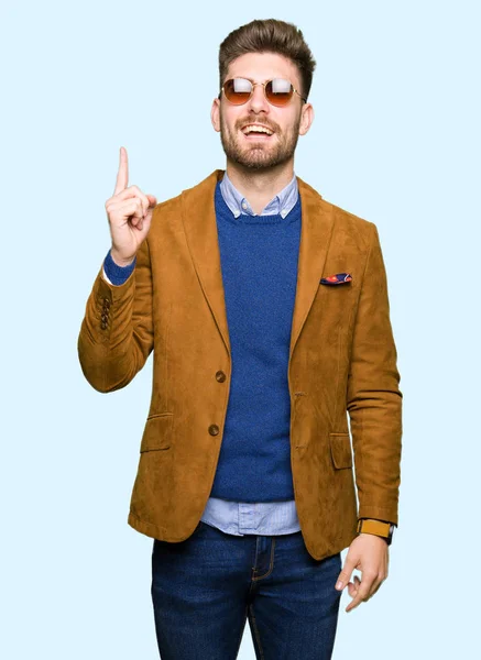 Young Handsome Elegant Man Wearing Sunglasses Pointing Finger Successful Idea — Stock Photo, Image