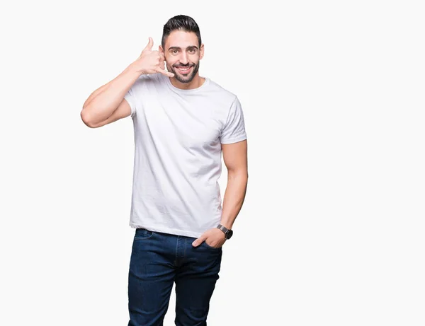 Jovem Vestindo Camiseta Branca Casual Sobre Fundo Isolado Sorrindo Fazendo — Fotografia de Stock