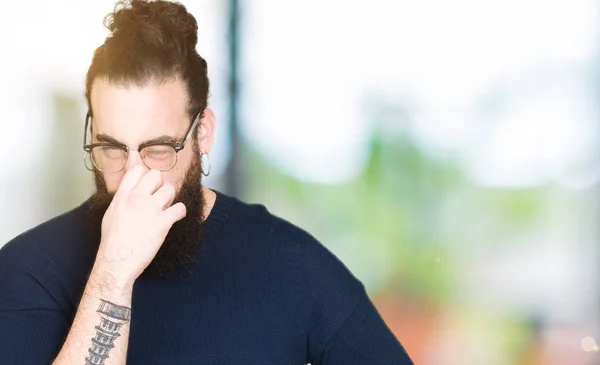 Young Hipster Man Long Hair Beard Wearing Glasses Smelling Something — Stock Photo, Image