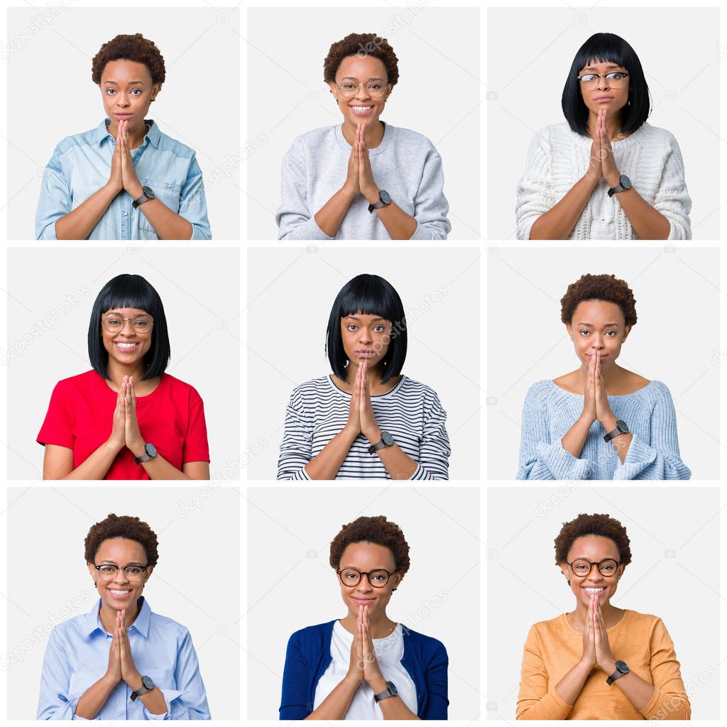 Young african american woman with afro hair over isolated background praying with hands together asking for forgiveness smiling confident.