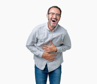 Yakışıklı orta yaş zarif komuta sizde gözlük izole üzerinde arka plan gülen ve komik deli şaka çünkü yüksek sesle zor gülüyor. Mutlu ifade.