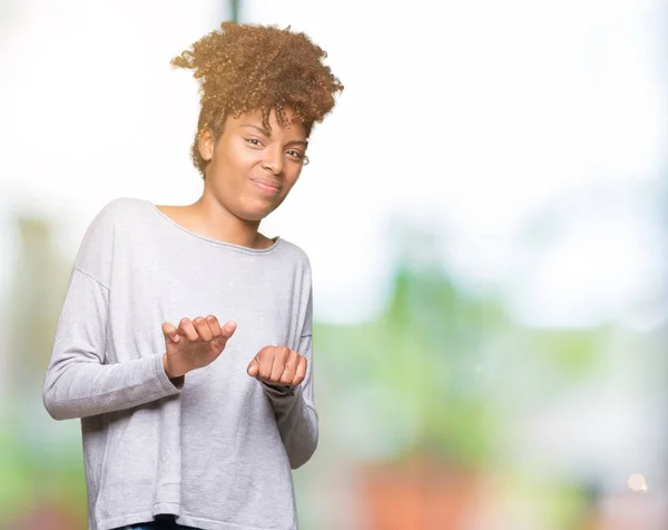 Beautiful young african american woman over isolated background disgusted expression, displeased and fearful doing disgust face because aversion reaction. With hands raised. Annoying concept.