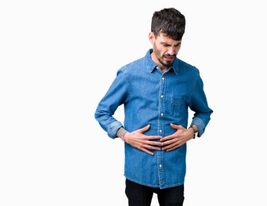Genç yakışıklı adam izole mide üzerinde el ile arka plan çünkü hazımsızlık, ağrılı hastalık hasta hissediyor. Ağrısı kavramı.