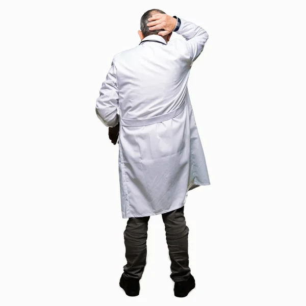 Handsome Senior Doctor Man Wearing Medical Coat Backwards Thinking Doubt — Stock Photo, Image