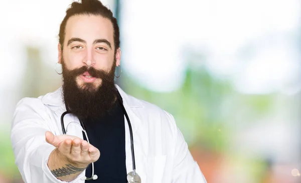 Doctor Long Hair Wearing Medical Coat Stethoscope Looking Camera Blowing — Stock Photo, Image