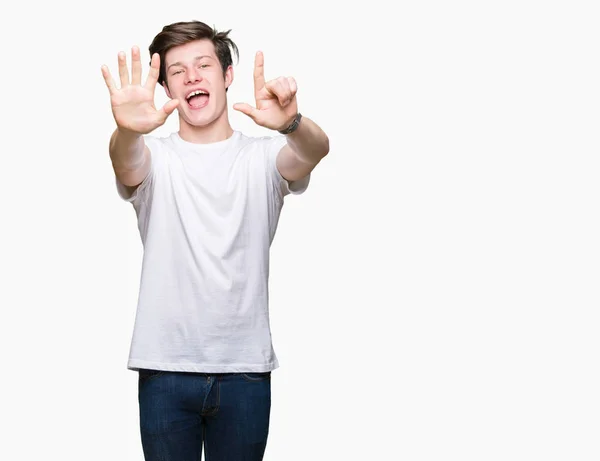 Junger Gutaussehender Mann Lässigem Weißem Shirt Vor Isoliertem Hintergrund Der — Stockfoto