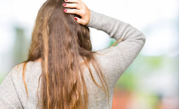 Young Beautiful Woman Wearing Winter Dress Backwards Thinking Doubt Hand — Stock Photo, Image