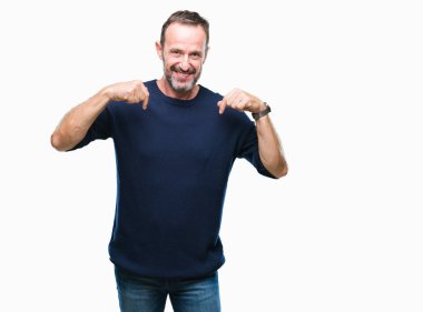 Orta yaş ağarmış komuta sizde yüzünde gülümseme ile kendinden emin görünüyorsun, kendini gururlu ve mutlu parmakları ile işaret izole arka plan üzerinde.