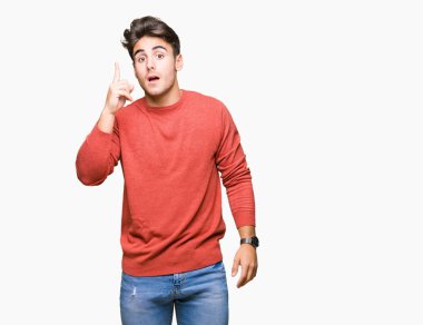 Yakışıklı delikanlı ile başarılı fikir parmağı yukarıyı izole arka plan üzerinde. Çıktıktan ve mutlu. Bir numara.