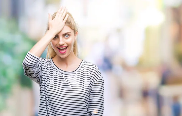 Young Beautiful Blonde Woman Wearing Stripes Sweater Isolated Background Surprised — Stock Photo, Image