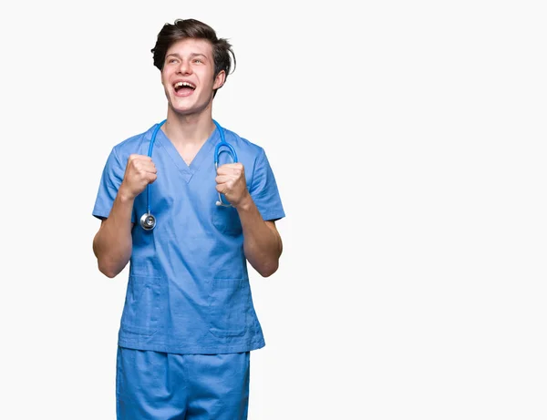 Joven Médico Vistiendo Uniforme Médico Sobre Fondo Aislado Muy Feliz — Foto de Stock